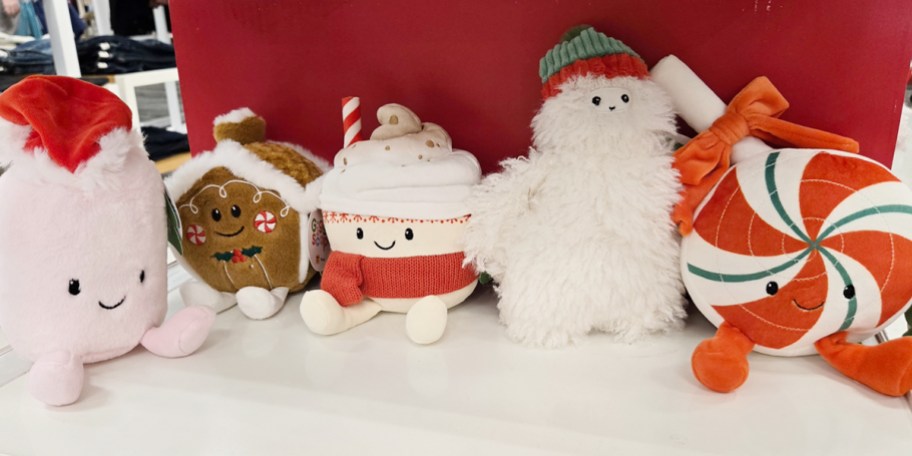 marshmallow, gingerbread house, coffee mug, and candy plushes