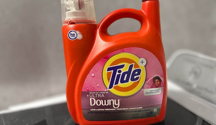 a bottle of tide w a touch of ultra downy