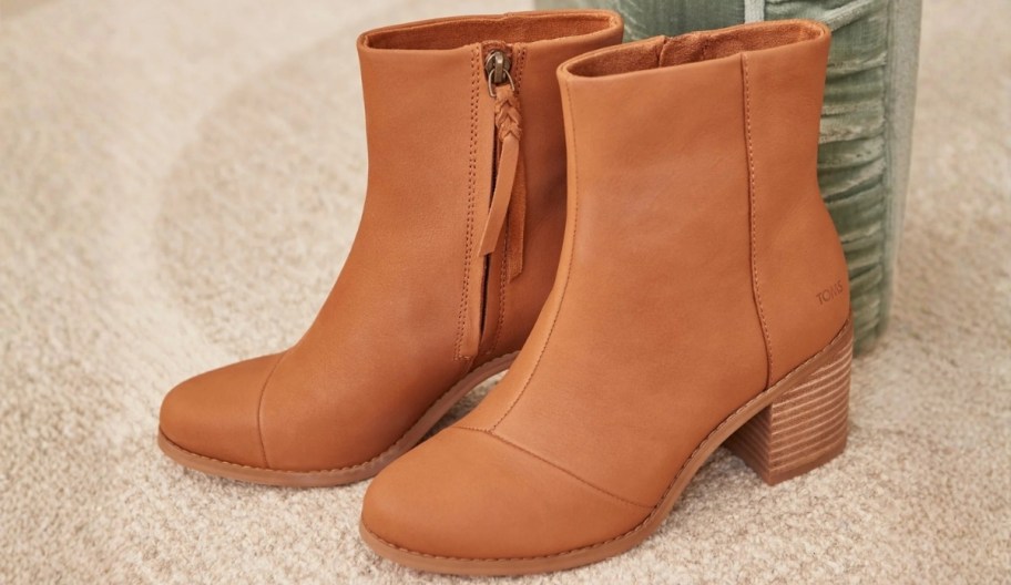 a pair of tan womens ankle boots