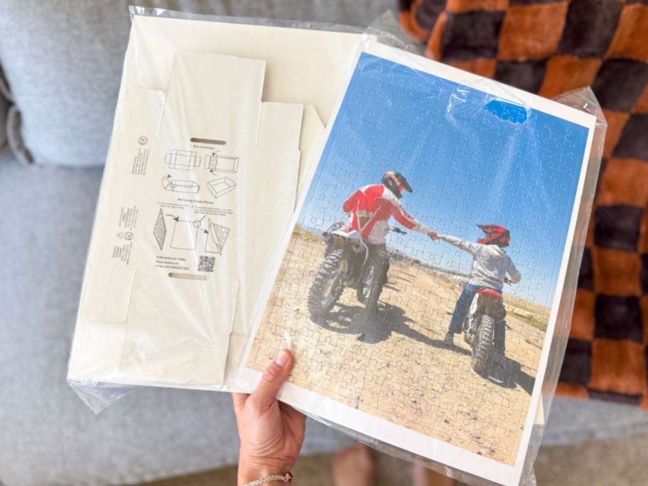 hand holding walgreens puzzle pieces