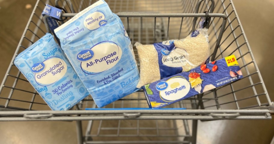 sugar, flour, rice, and pasta in a walmart cart