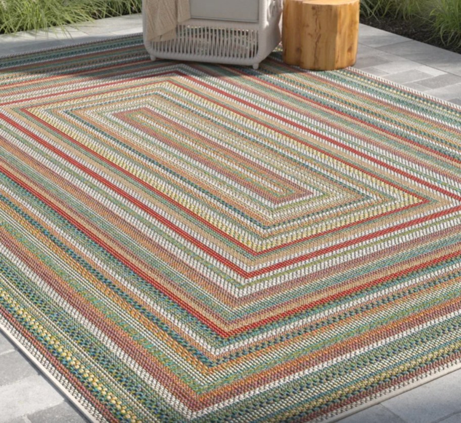 rainbow rectangle area rug outside