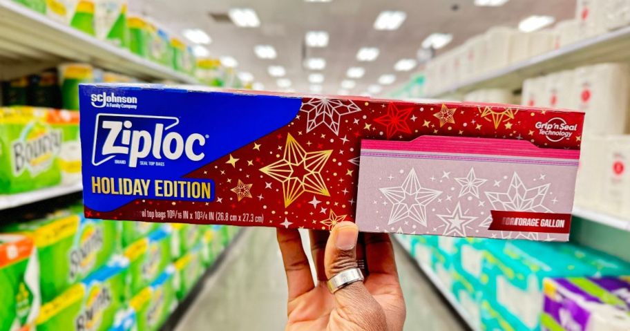 hand holding ziploc holiday bag box in store