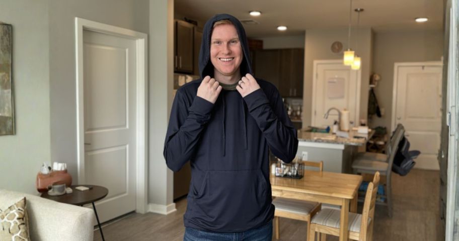 man wearing 32 degrees black hoodie