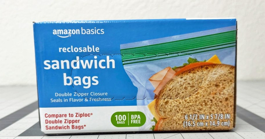 blue box of Amazon Basics Sandwich Bags on a counter