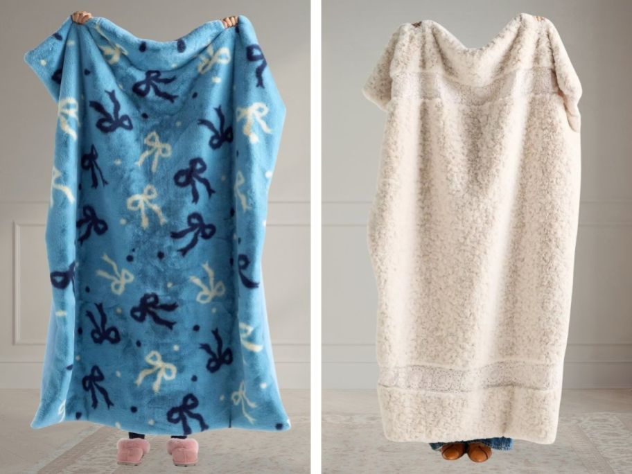 two people holding blankets in front of them in blue and white bows and white