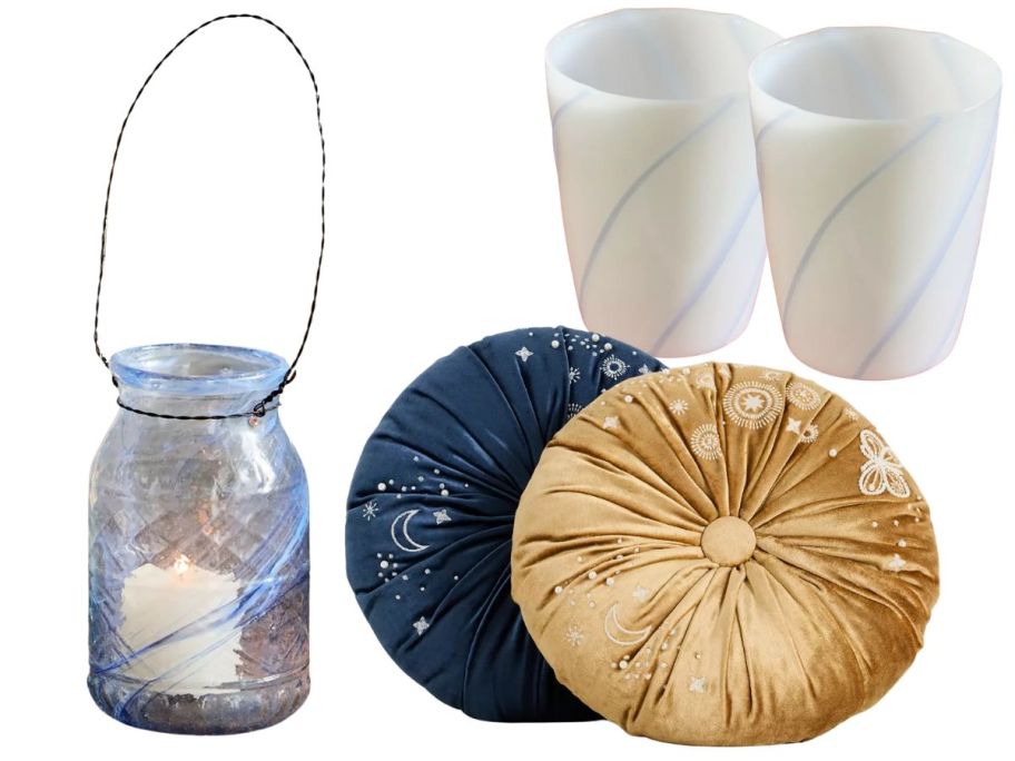 a hanging lantern, two round pillows, and two cups