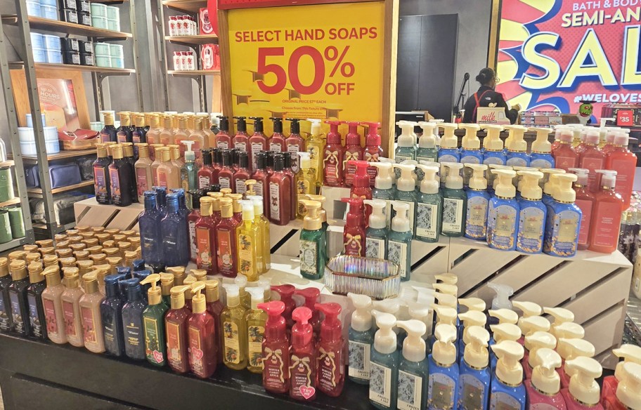 store display of Bath & Body Works Hand Soaps with 50% off sale sign