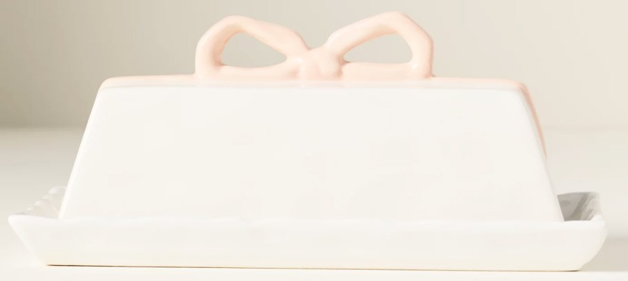 butter dish with a pink bow on top