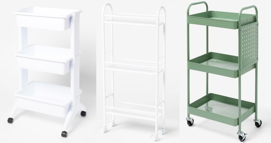 three white and green storage carts