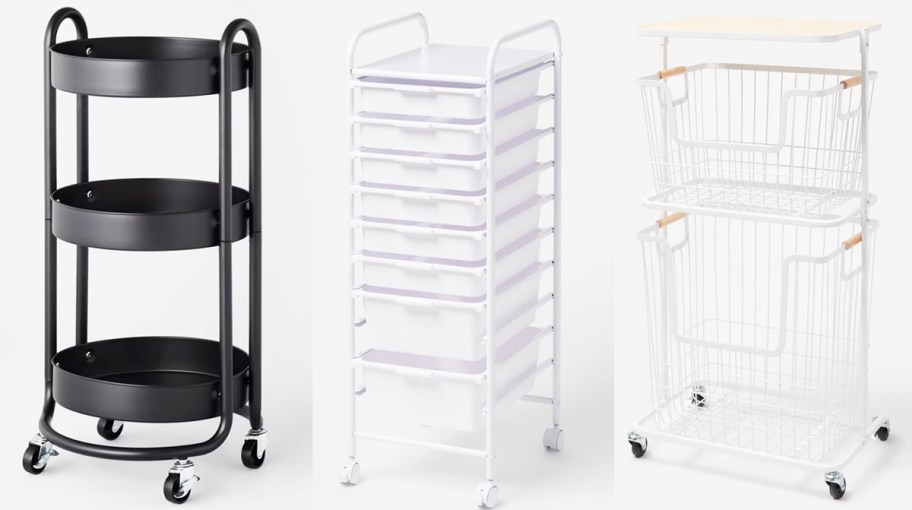 three black and white storage carts