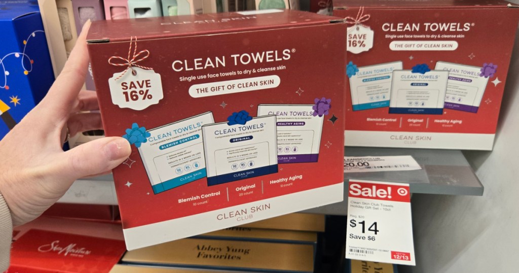 woman holding box of Clean Towels Set in target
