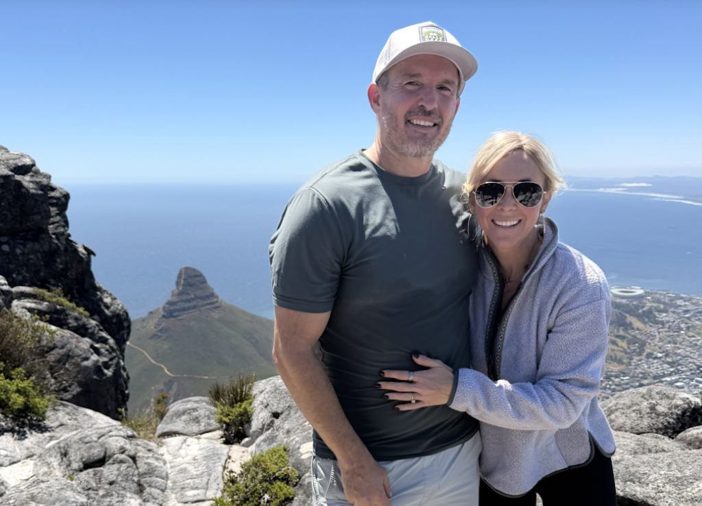 Collin with husband on mountain in Africa 