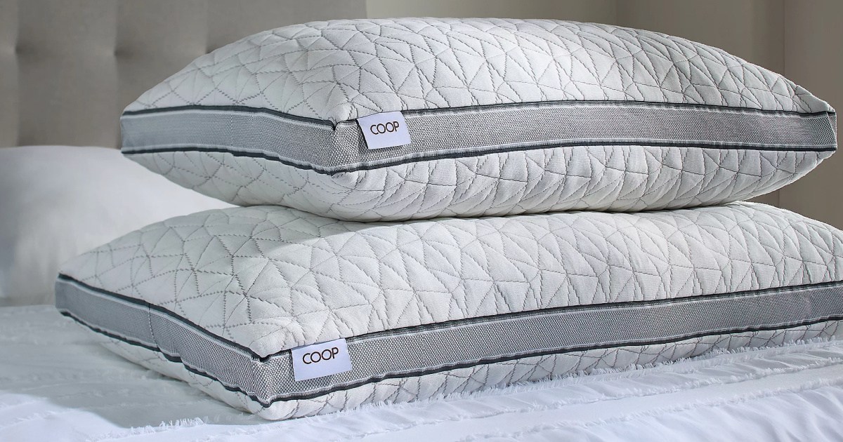 2 Coop Sleep Goods Eden Cooling Adjustable Pillows on bed