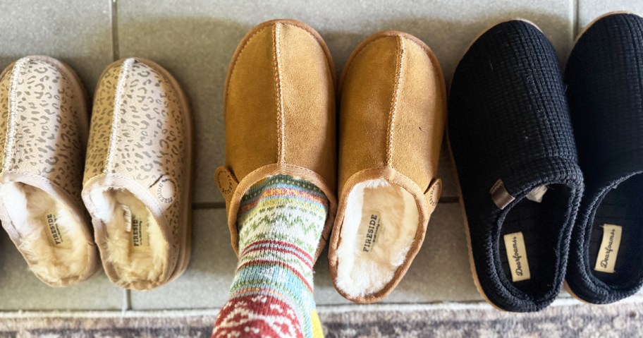 foot slipping into a pair of dearfoams slippers