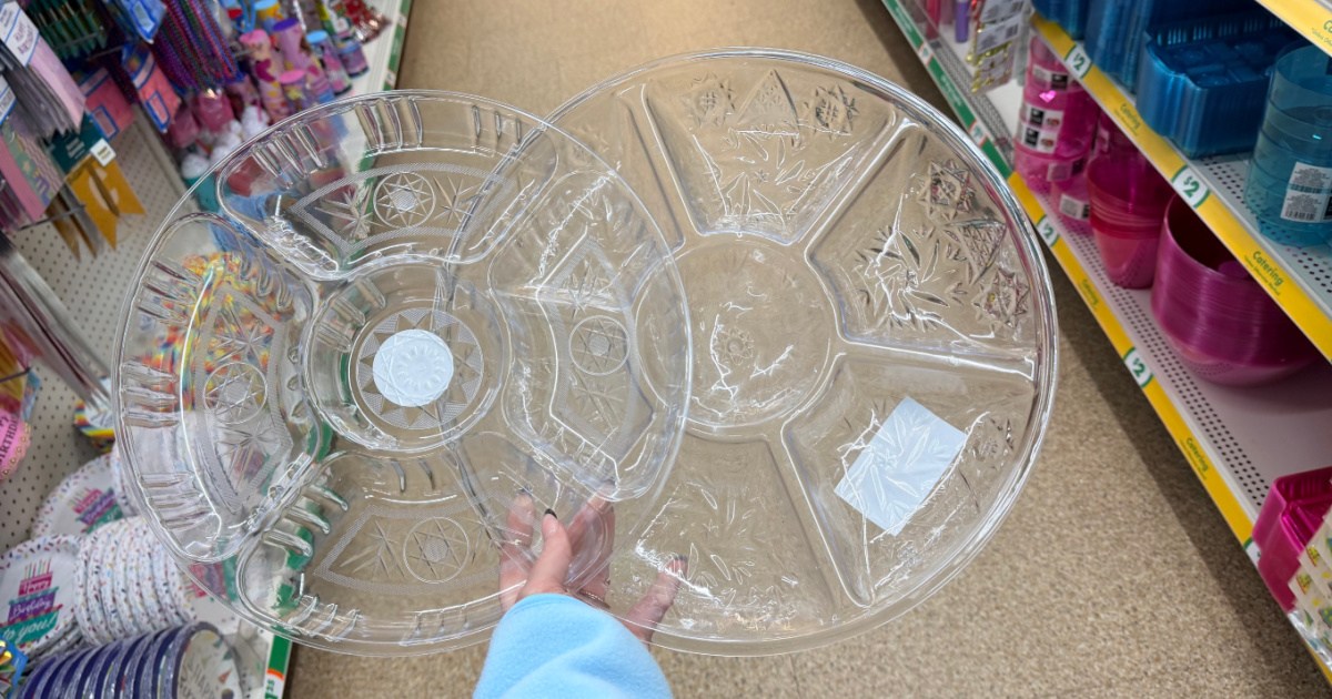 hand holding 2 different chip & dip trays inside dollar tree