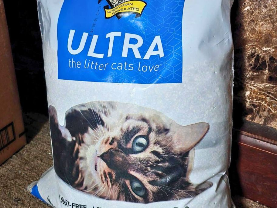 bag of Dr. Elsey's Ultra Unscented Clumping Clay Cat Litter 18lb Bag on the floor