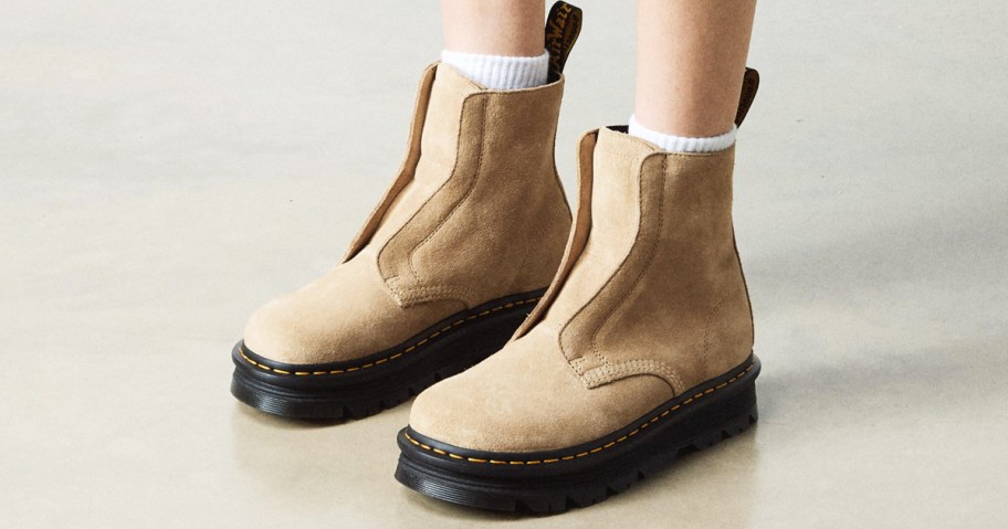 man wearing tan suede laceless boots