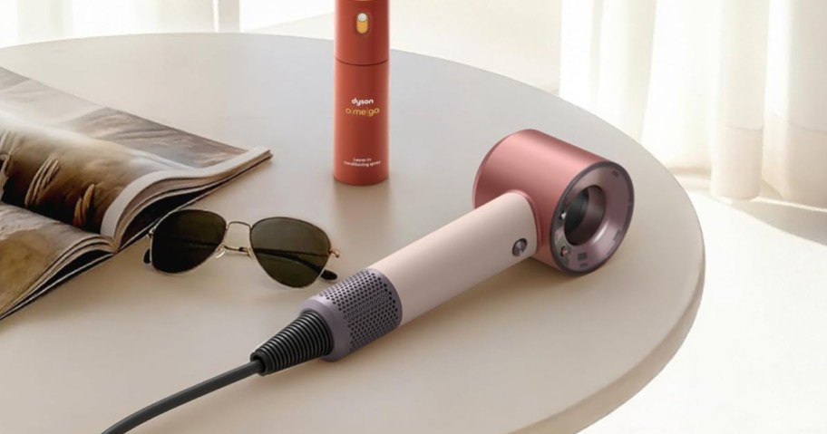 dyson hair dryer on a table
