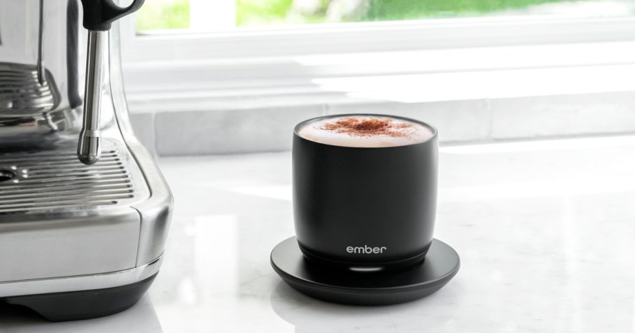 black ember coffee mug near an espresso machine