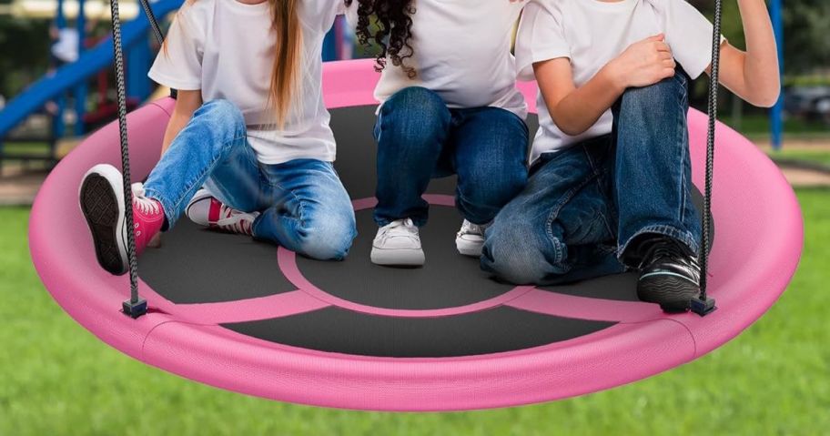 kids on saucer swing
