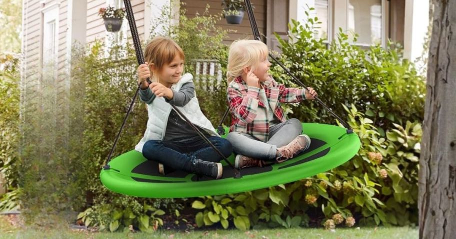 kids on saucer swing