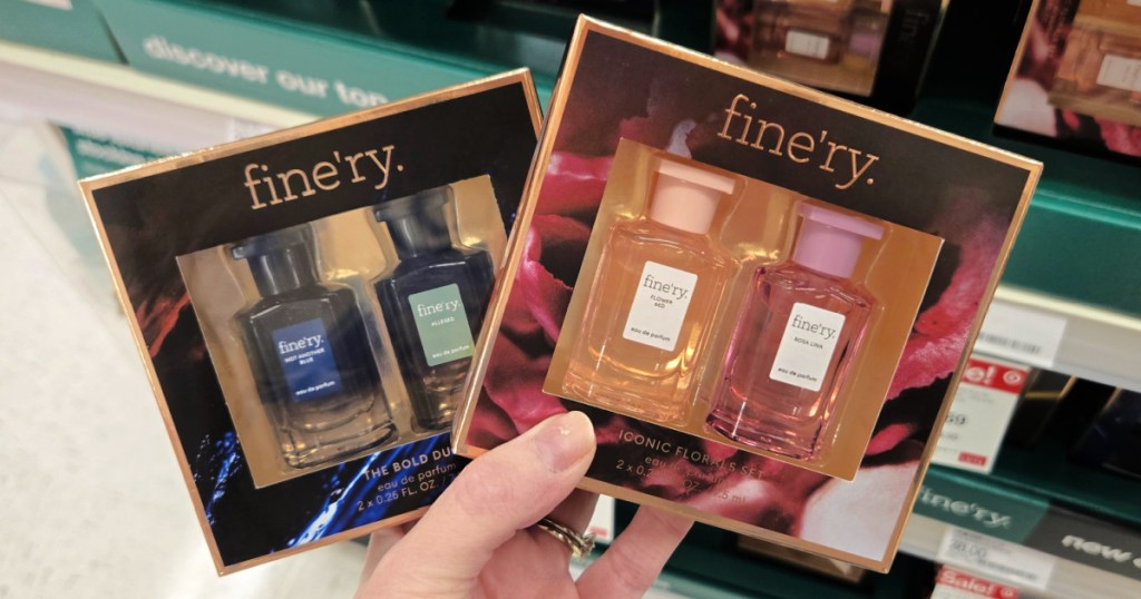 woman holding Finery Gift Sets in hand