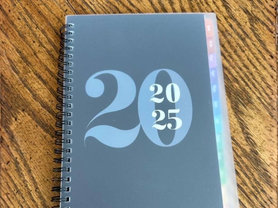 a coil bound 2026 planner on a desk