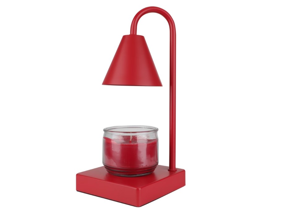 a red Candle Warmer lamp with a candle on it