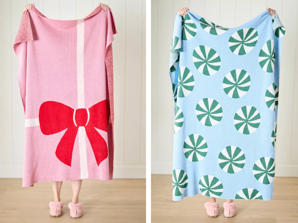 Person holding up holiday themed, throw blankets featuring Bow and peppermint candies