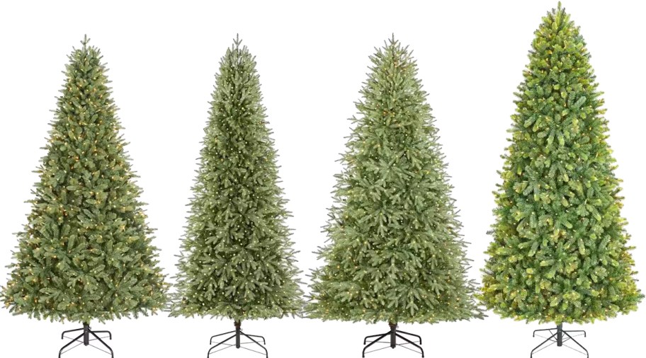 4 artificial christmas trees in a row