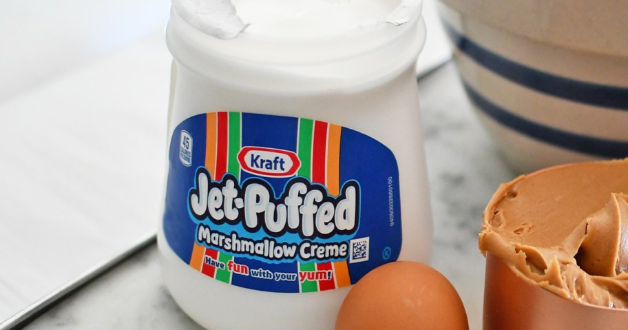 jar of Jet-Puffed Marshmallow Creme on counter near cookie ingredients
