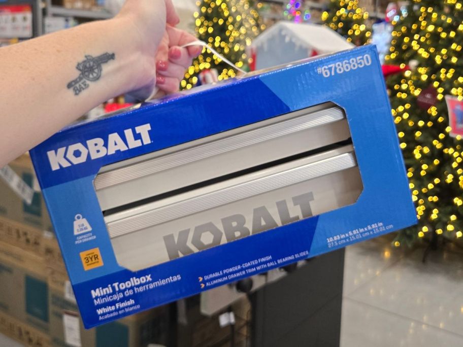 Hand holding a white Kobalt Mini toolbox