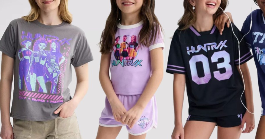 A teen and two girls wearing kpop demon hunter clothes
