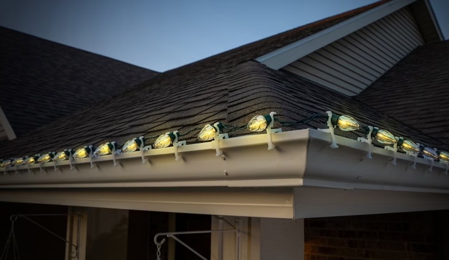A series of LED lights installed in the gutters of a house