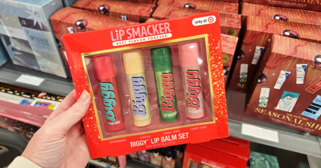 woman holding Lip Smacker Biggy Lip Balm Set in target