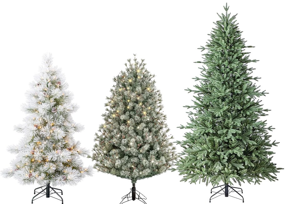 3 artificial christmas trees in a row