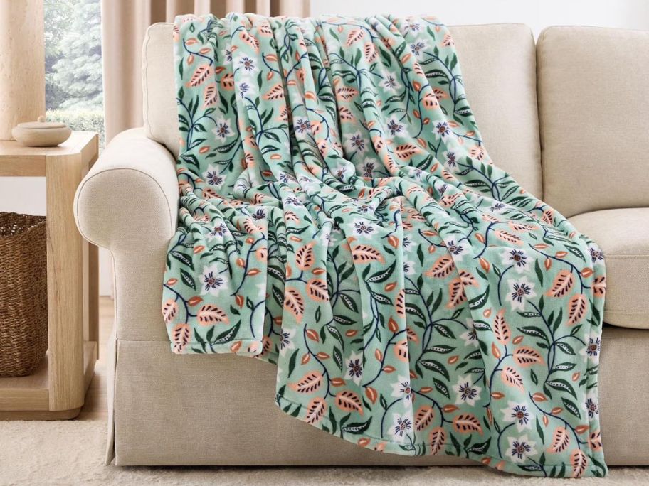 flower vines Member's Mark Seasonal 60 x 70 Lounge Throw on couch