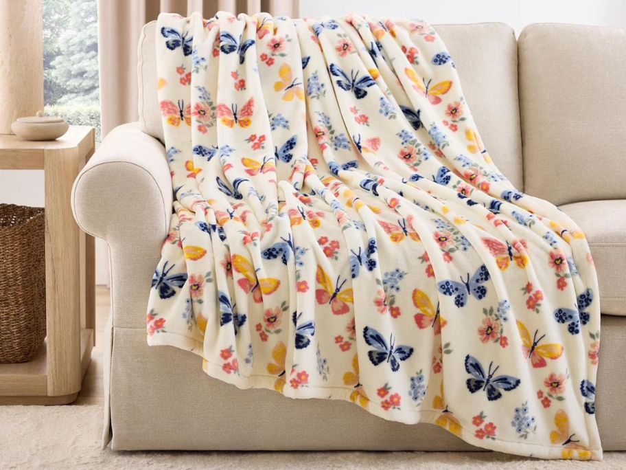 butterfly flutter Member's Mark Seasonal 60 x 70 Lounge Throw on couch