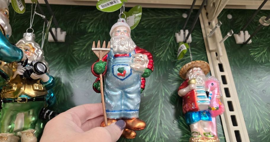 Glass Santa ornaments in a store