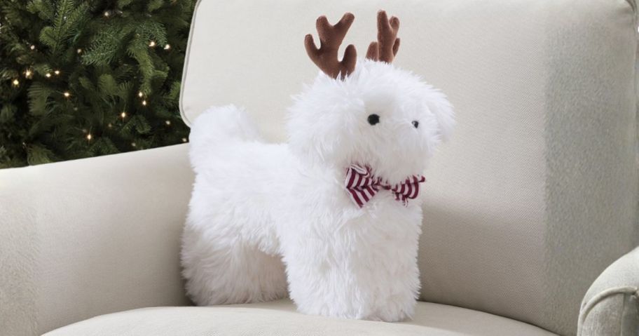 My Texas House Andy 12 x 17 Christmas Toy Dog Holiday Decorative Pillow on couch