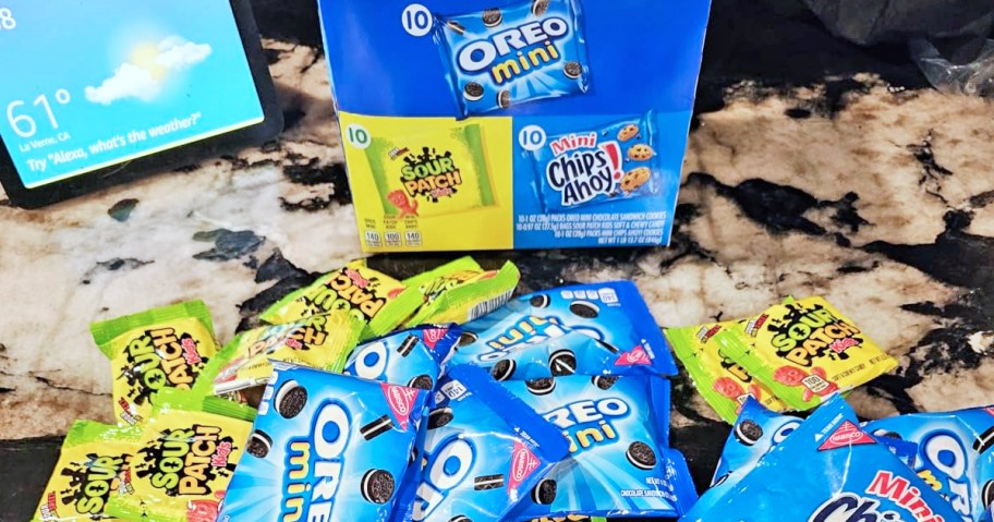 mini packs of oreos and sour patch kids on kitchen counter