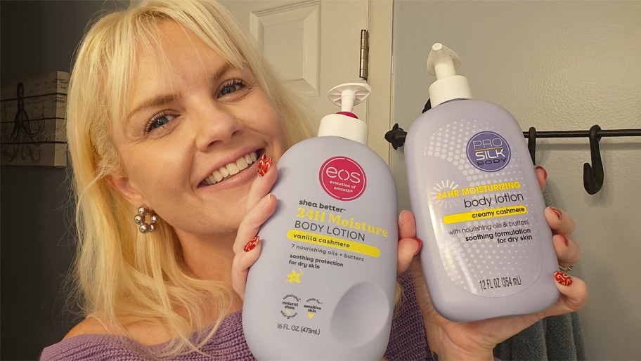 woman holding up purple bottles of eos and Pro Silk body lotions