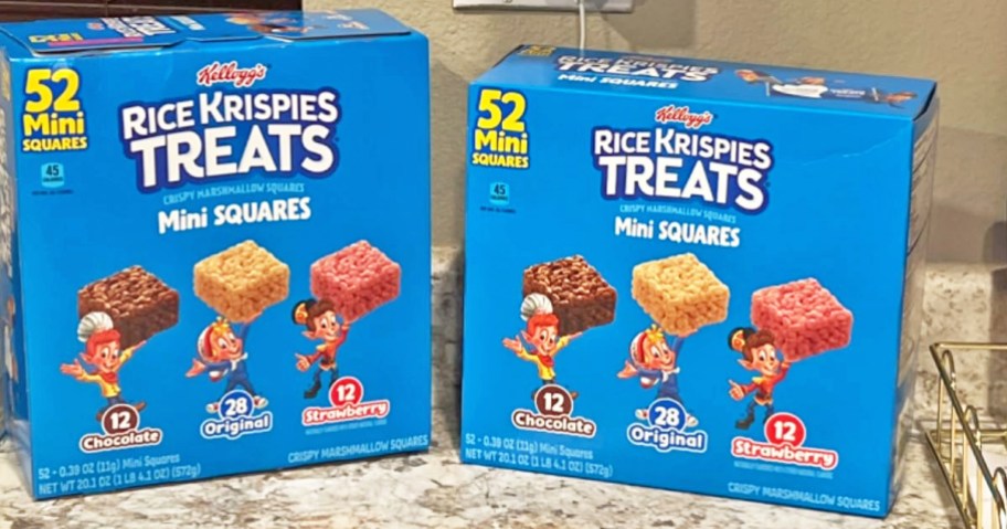 two blue Rice Krispies Treats Mini Squares variety pack boxes on kitchen counter