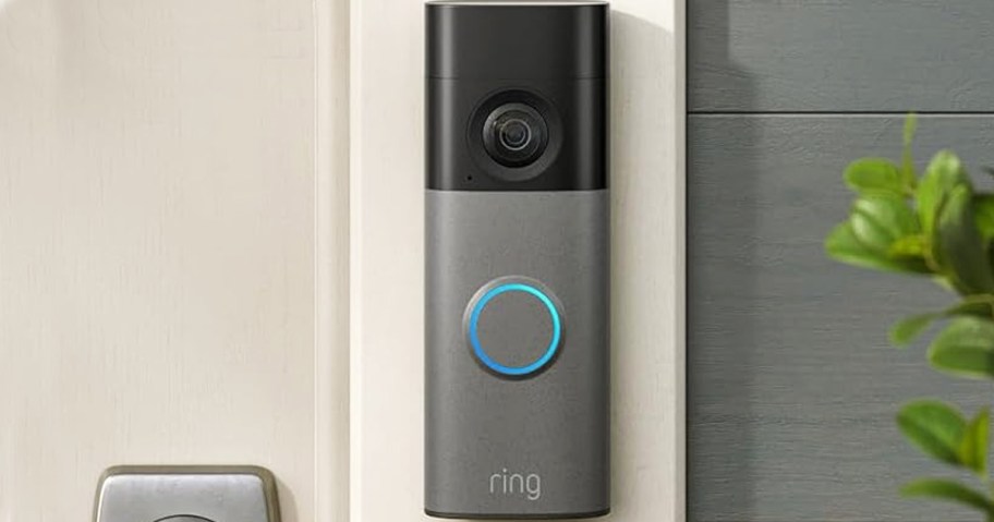 grey ring doorbell next to front door