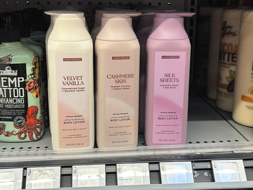 Scent theory bottles of lotion on Walmart store she
