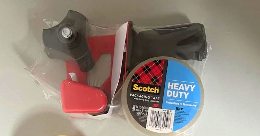 Scotch Packing Tape with Dispenser on white countertop 