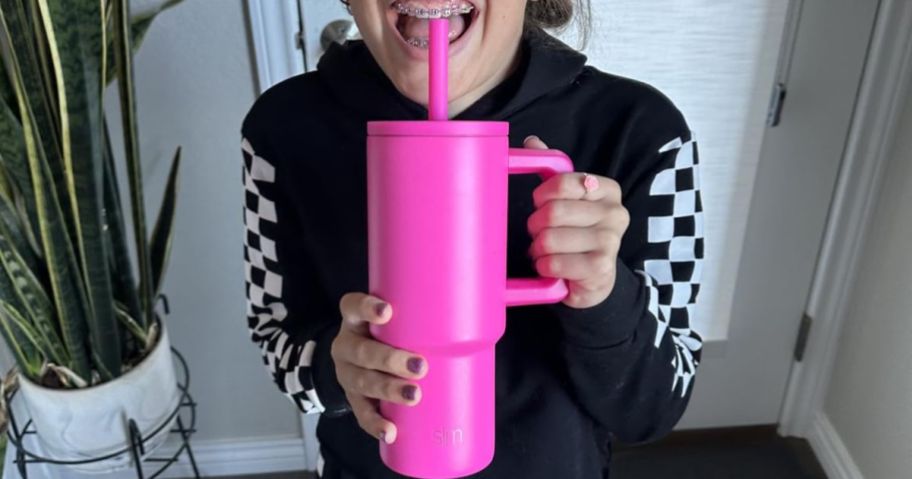 Girl with a hot pink Simple Modern Tumbler