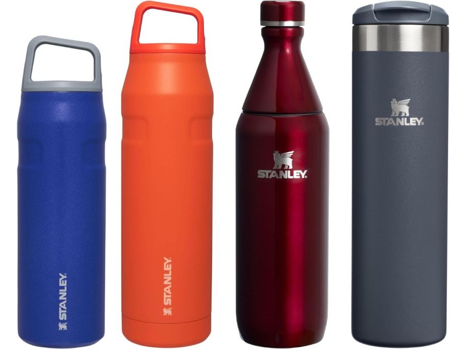 2 water bottles with handles on the top in blue and orange, a red water bottle, and a gray tumbler