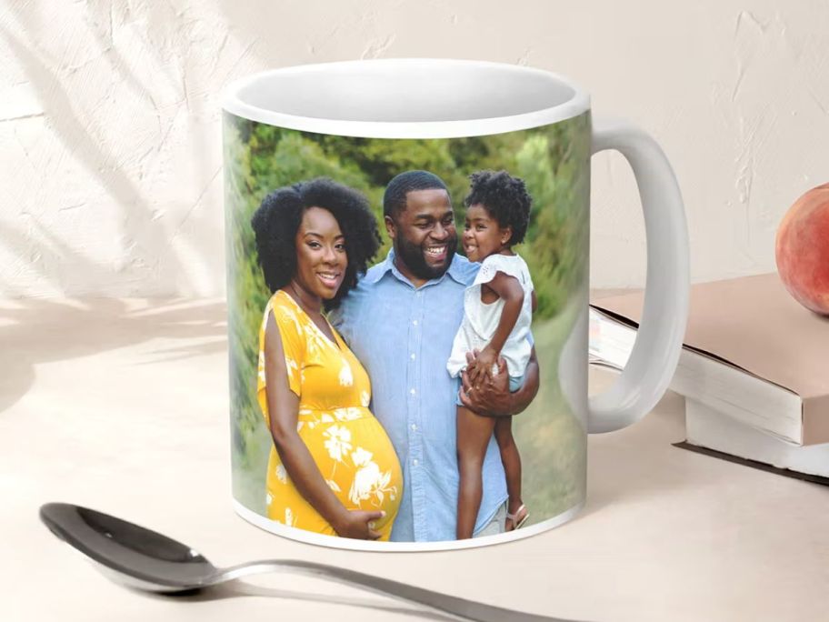 A mug with the picture of a family on it